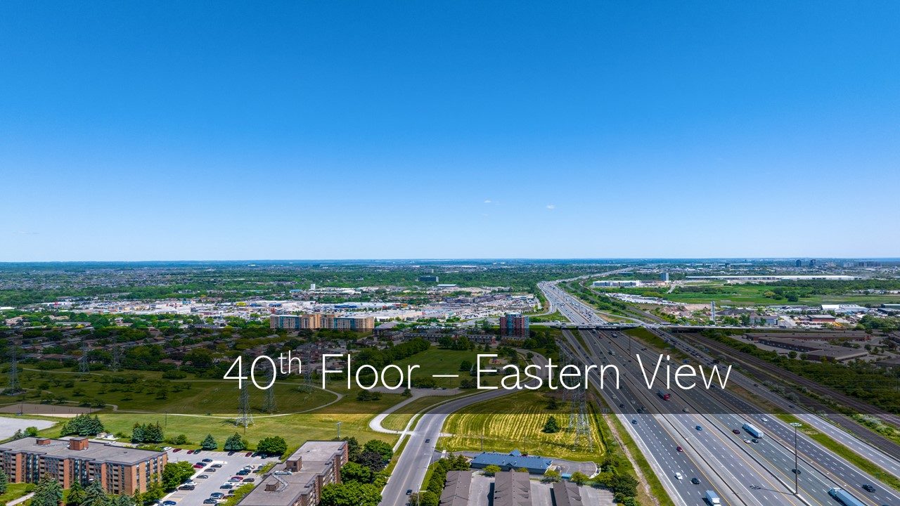 1515 Pickering Parkway 40th floor eastern view looking over a highway and green space (photograph)