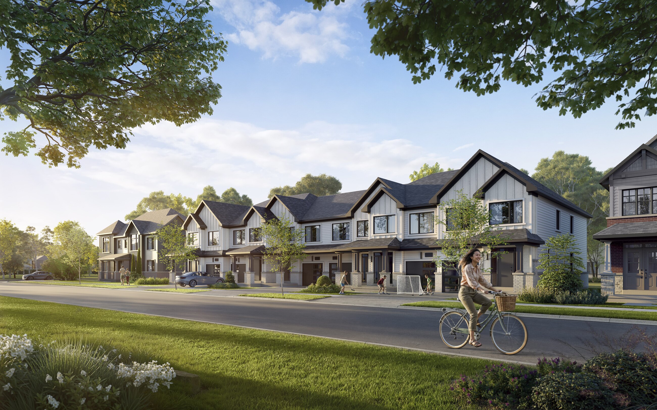 The Heights of Harmony exterior streetscape of townhomes with people (artist's concept)