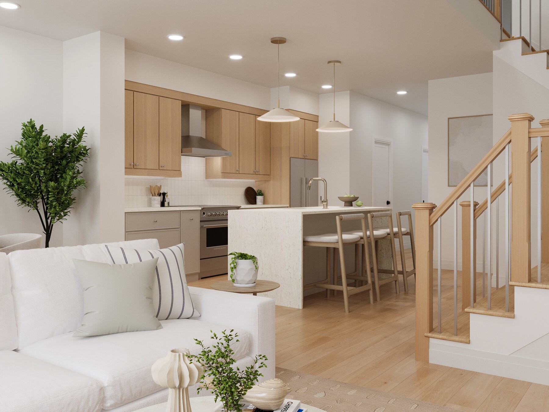 The Heights of Harmony kitchen with island, living area, and staircase (artist's concept)