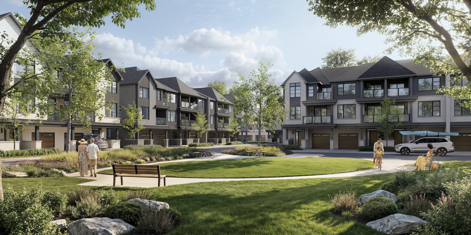 Pier House Townhomes townhouses facing a grassy courtyard park with a walking path (artist's concept)
