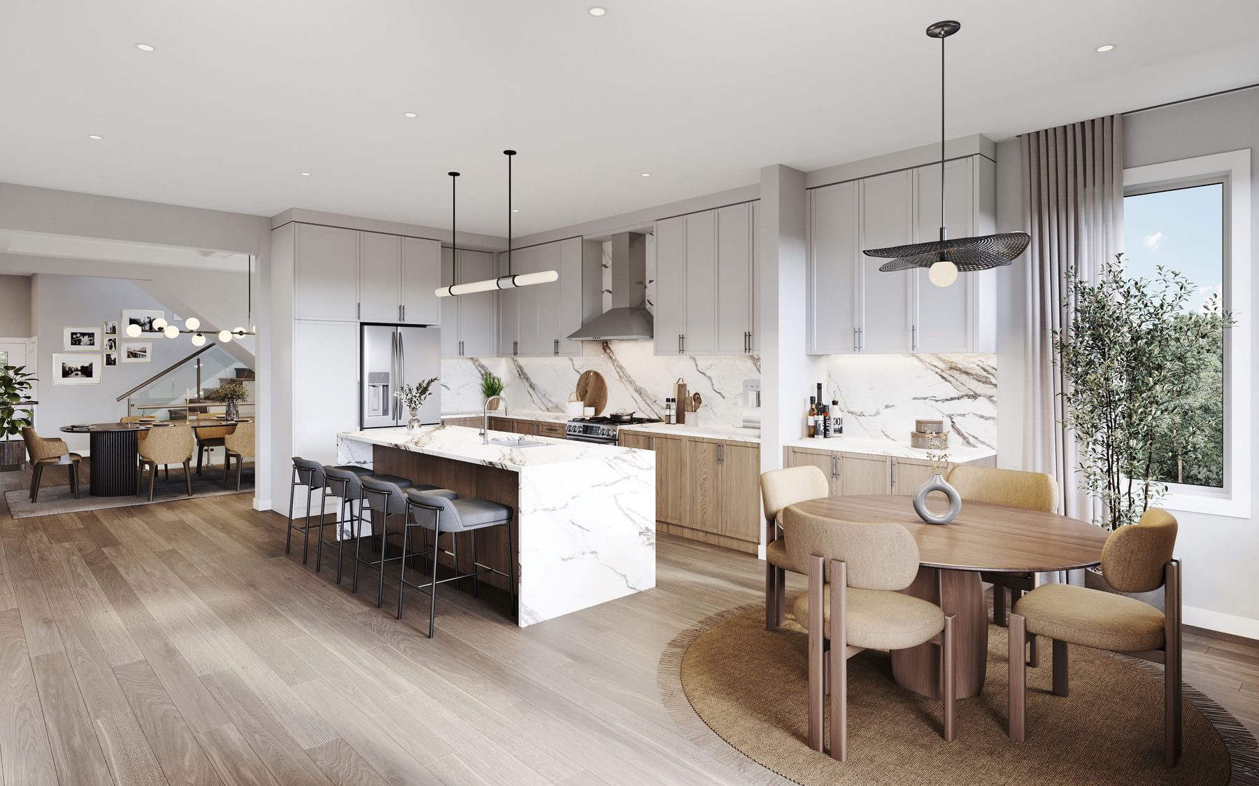 Summer Valley open-concept kitchen with marble island and dining table (artist's concept)