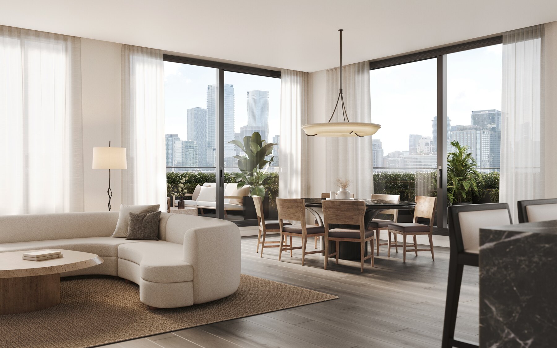 The Bedford living room with a curved sofa and city view (artist's concept)