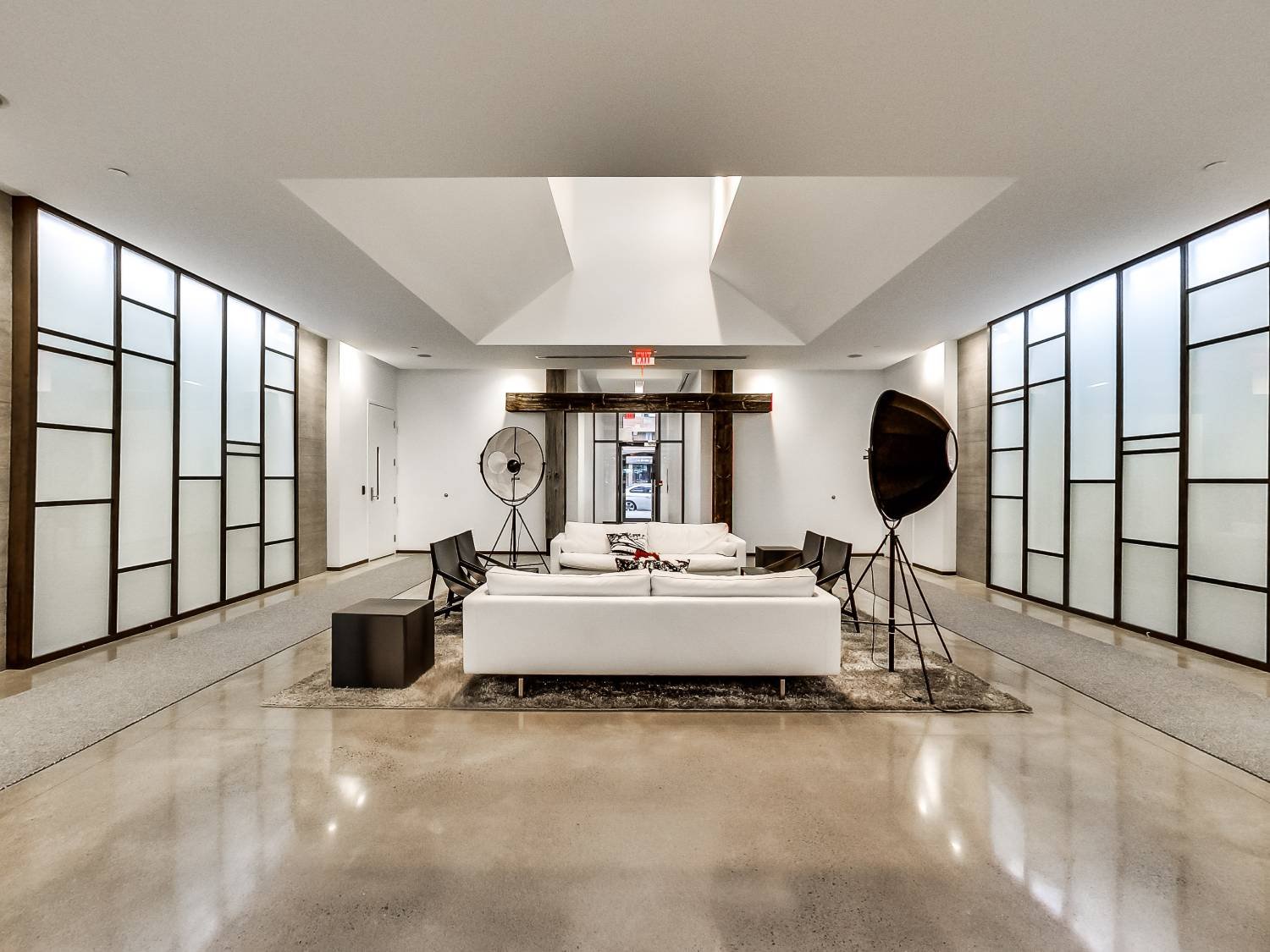 A cinematic King West loft interior — work with us